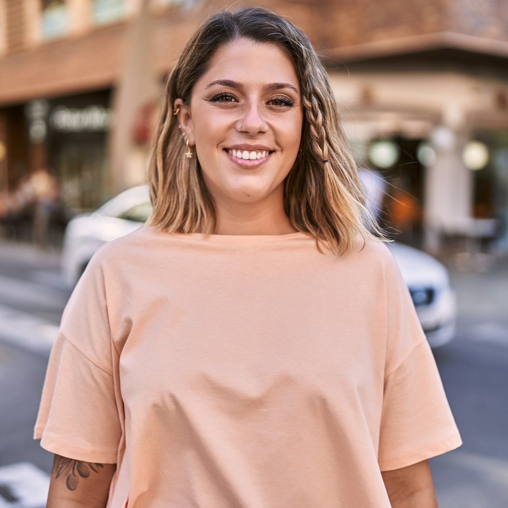 A woman smiling because she knows The Pregnancy Center of Greater Toledo offers Free Ultrasounds in Toledo, Ohio