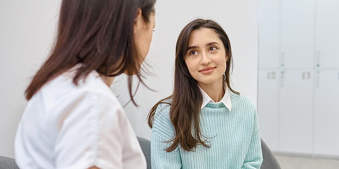 Two women talking about what to know before an abortion in Toledo, Ohio